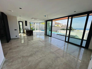 MUĞLA YALIKAVAKTA SİTE İÇİNDE DENİZ MANZARALI MODERN LÜKS SATILIK VİLLA