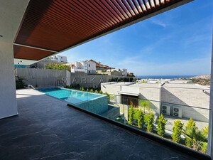 MUĞLA YALIKAVAKTA SİTE İÇİNDE DENİZ MANZARALI MODERN LÜKS SATILIK VİLLA